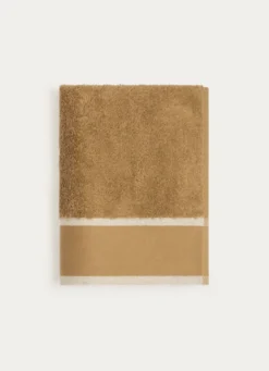 SERVIETTE DE TOILETTE UNIE À LARGE BORDURE ARTHUR CARAMEL
