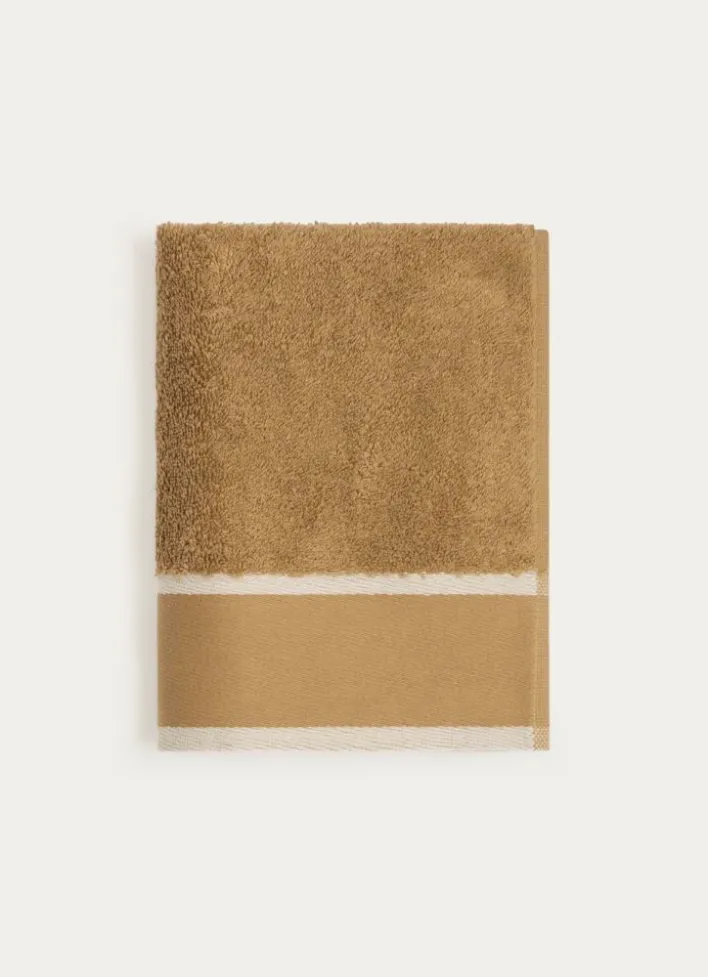 SERVIETTE DE TOILETTE UNIE À LARGE BORDURE ARTHUR CARAMEL