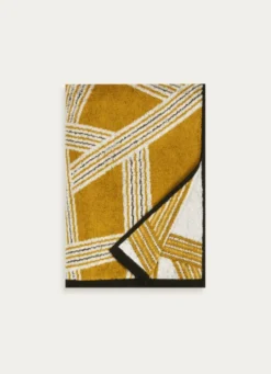 SERVIETTE INVITÉ JACQUARD MOTIFS GÉOMÉTRIQUES JAUNE OCRE